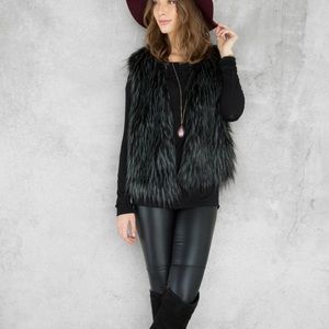 Black fur vest from Francesca’s like new!